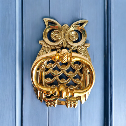 Brass door knocker, owl shape, gold color door decor.