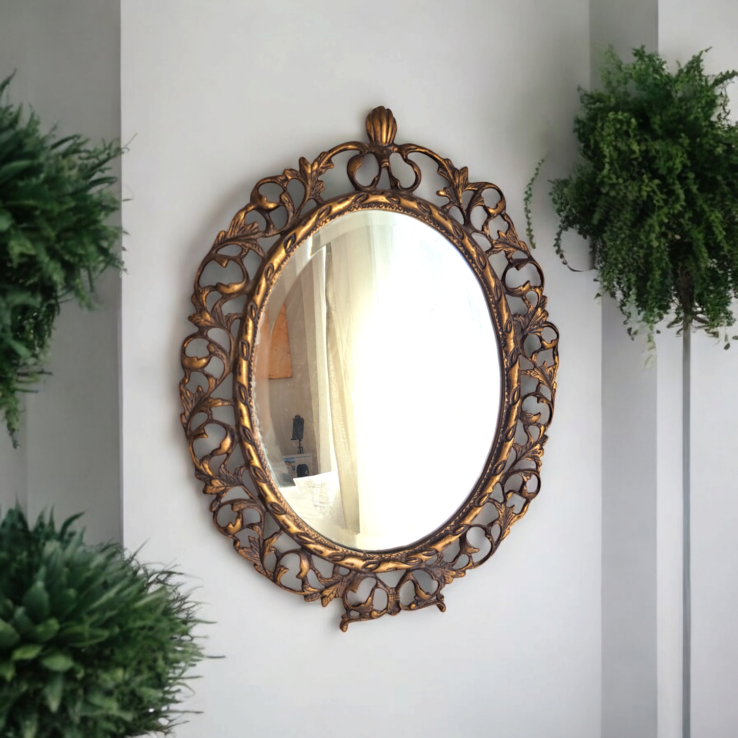 Add timeless charm to your space with this 50-year-old vintage brass mirror